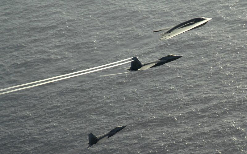 Stealth Aircraft over Ocean — Gray