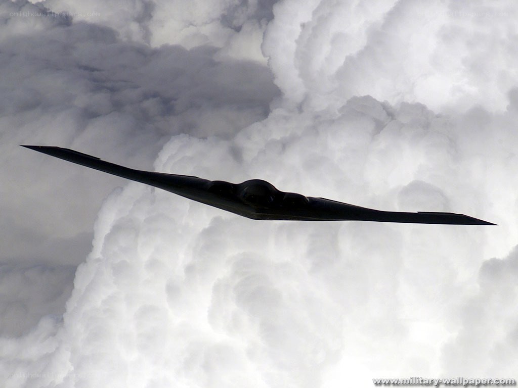 Stealth bomber in clouds
