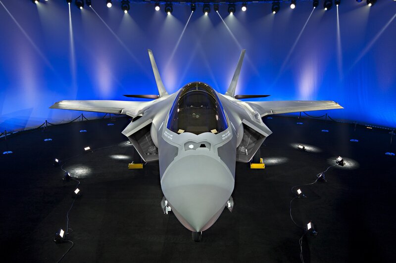 Stealth Fighter Jet — Blue, Dramatic, Photograph, Spotlights