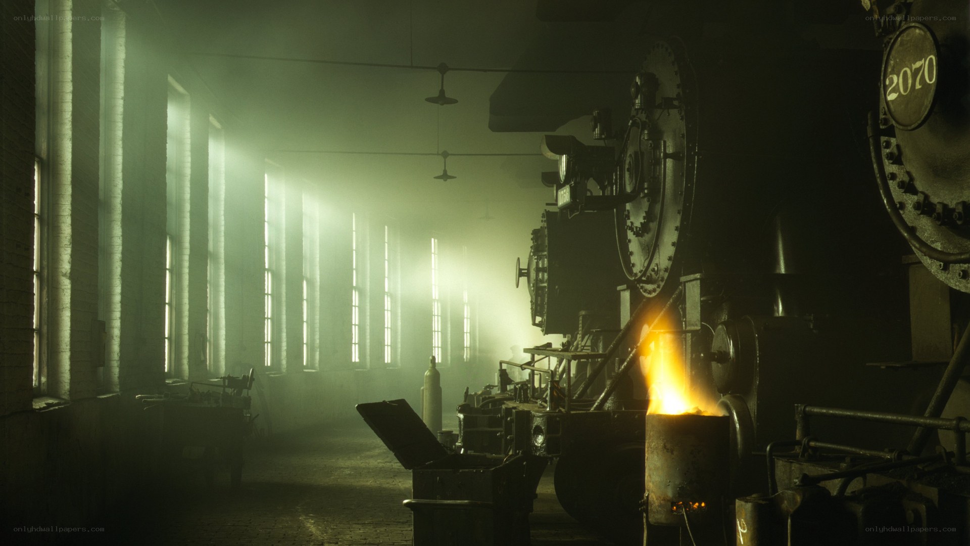 Steam engine in a foggy workshop
