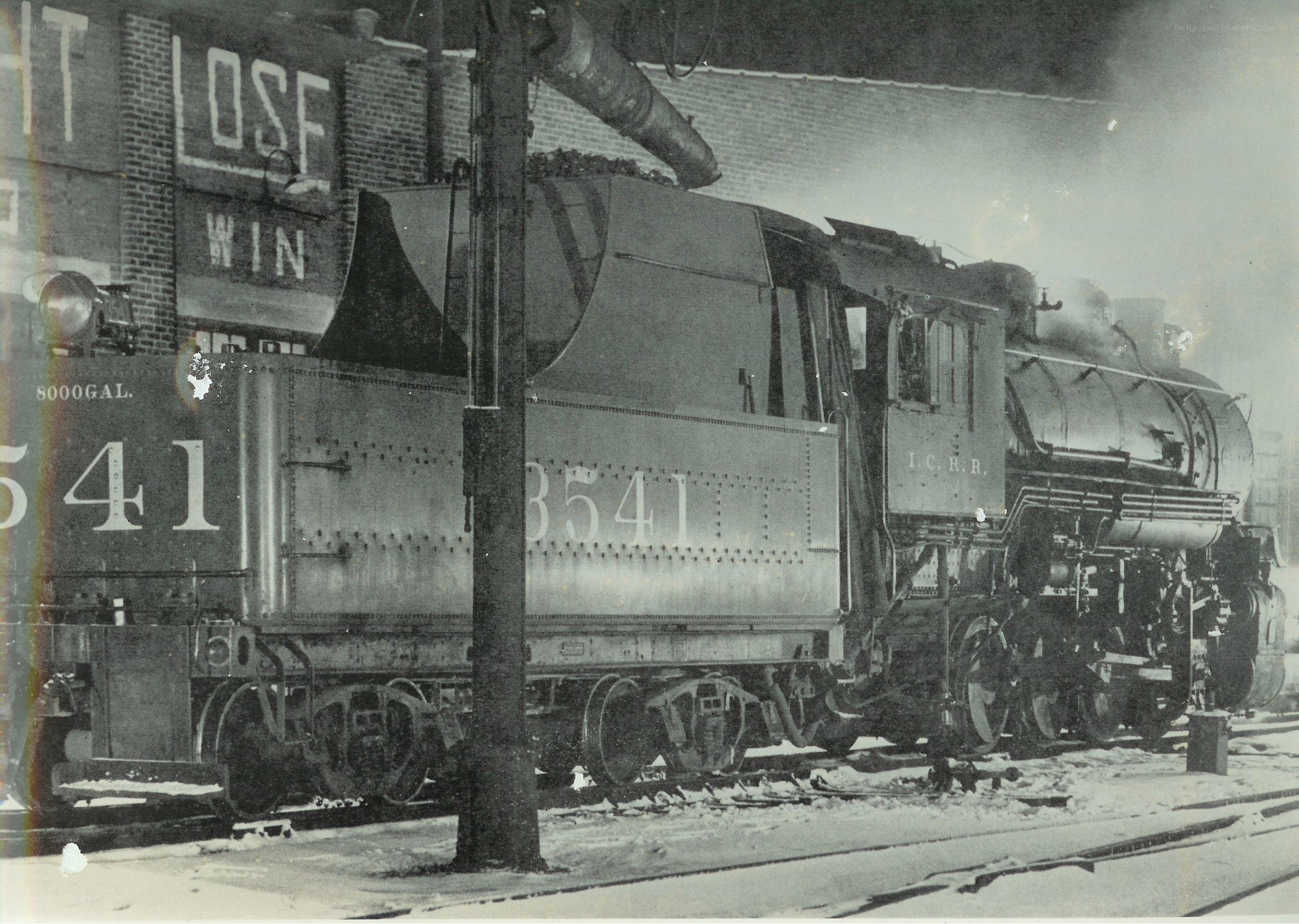 Steam locomotive at a rail yard