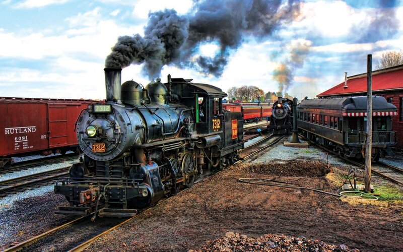 Steam locomotive at a railway yard