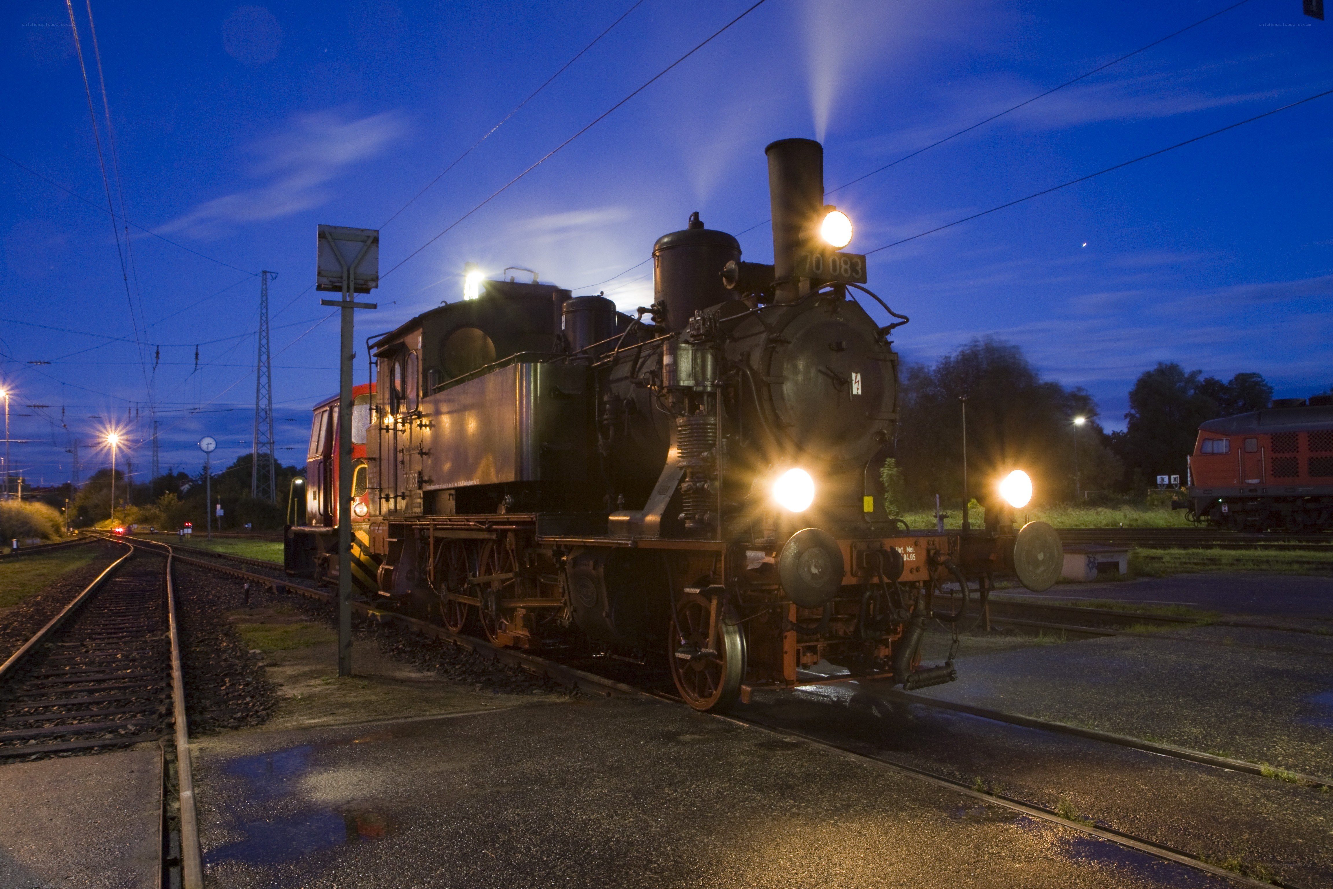 Steam locomotive at dusk