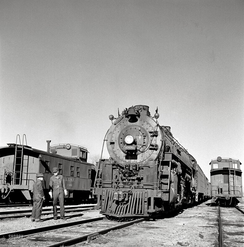 Steam locomotive at rail yard