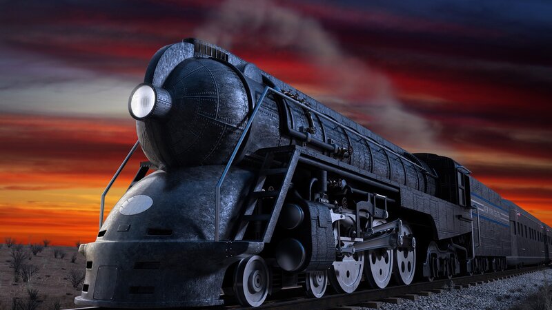 Steam locomotive at sunset