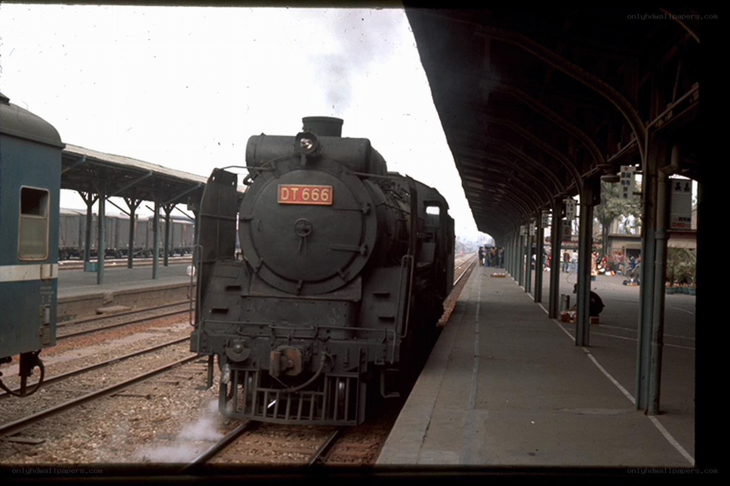 Steam locomotive at train station