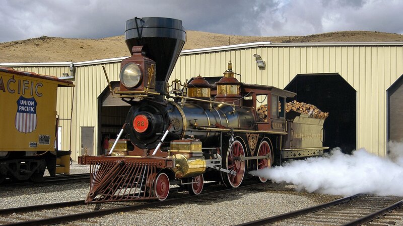 Steam locomotive on tracks