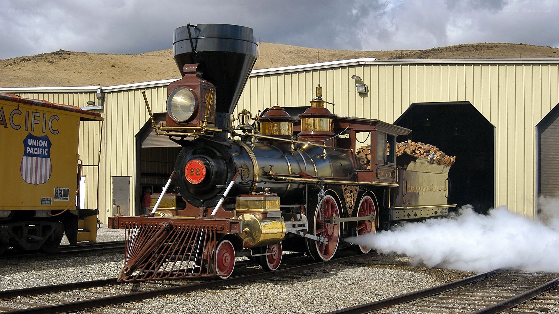 Steam locomotive on tracks