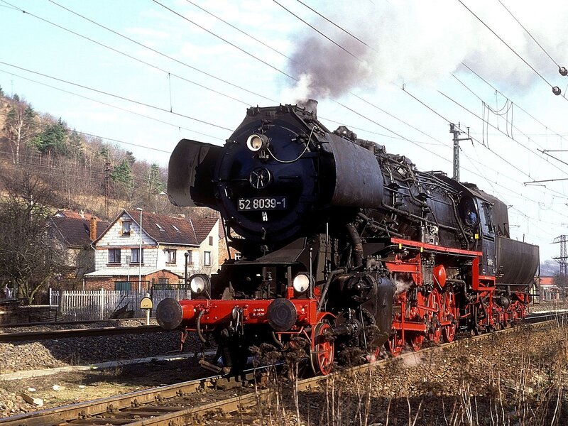 Steam locomotive on tracks