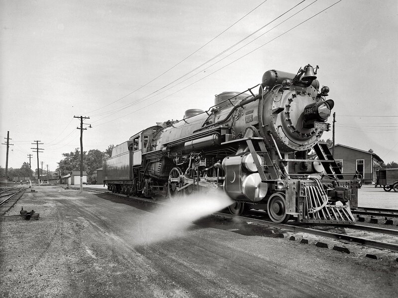 Steam locomotive on tracks