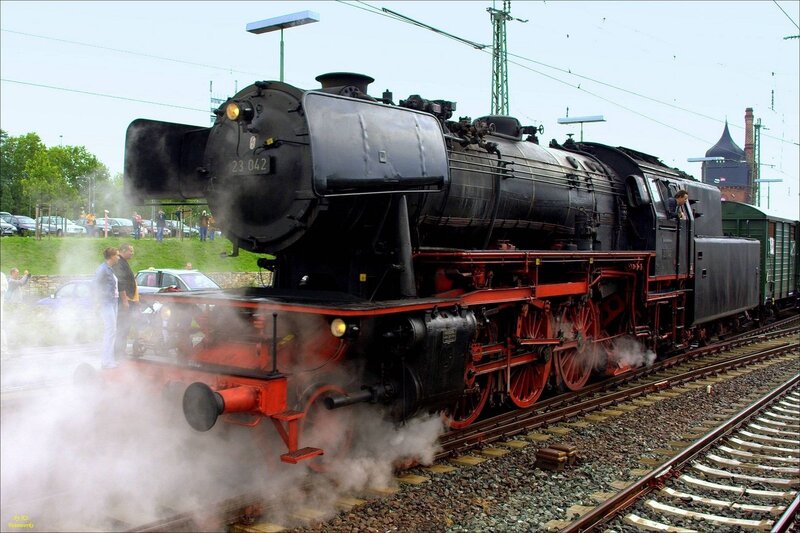 Steam locomotive on tracks