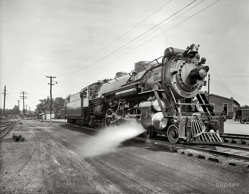Steam locomotive on tracks