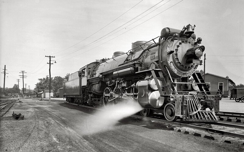 Steam locomotive on tracks