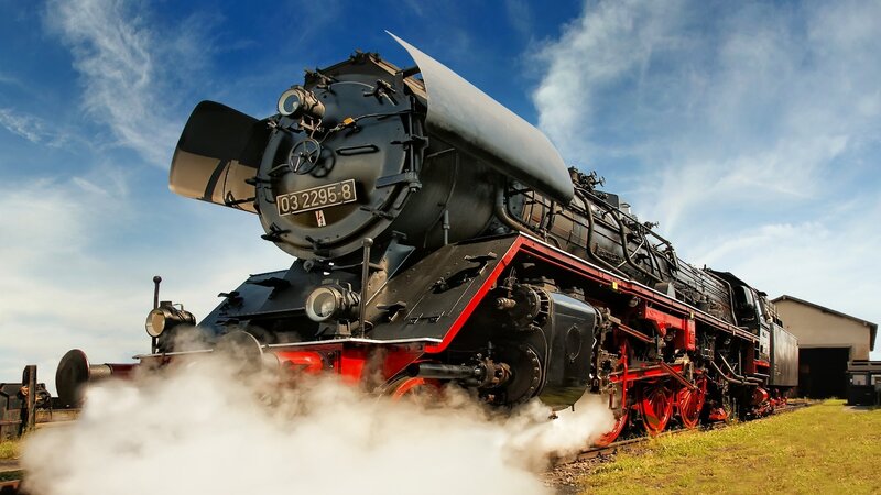 Steam locomotive on tracks