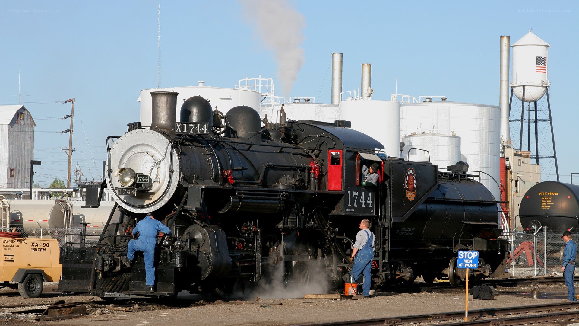 Steam locomotive on tracks