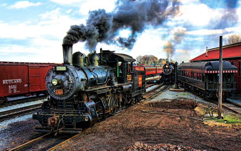 Steam Locomotive on Tracks — Black, Dramatic, Afternoon, Photograph