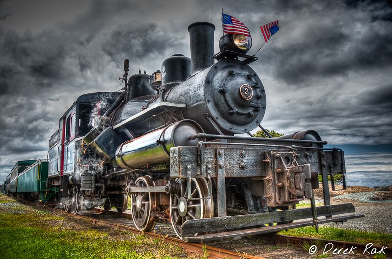 Steam Locomotive on Tracks — Black, Dramatic, Photograph