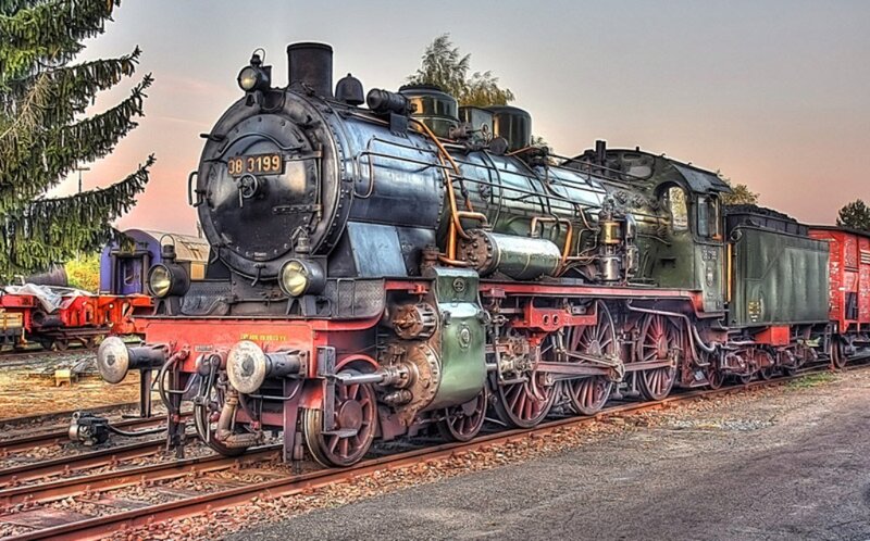 Steam Locomotive on Tracks — Black, Dramatic, Sunset