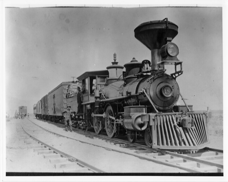 Steam Locomotive on Tracks — Black, Historical, Photograph