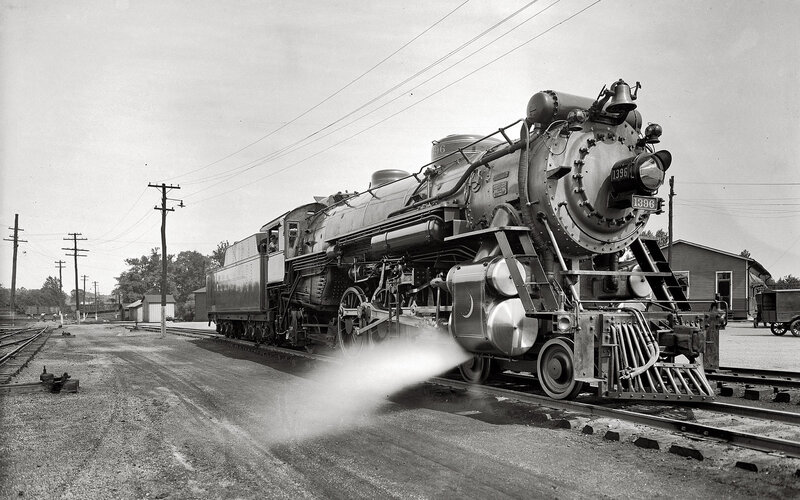 Steam Locomotive on Tracks — Black, Industrial, Afternoon