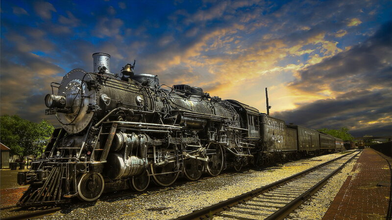 Steam Locomotive on Tracks — Blue, Dramatic, Sunset