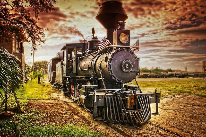Steam Locomotive on Tracks — Brown, Dramatic, Sunset