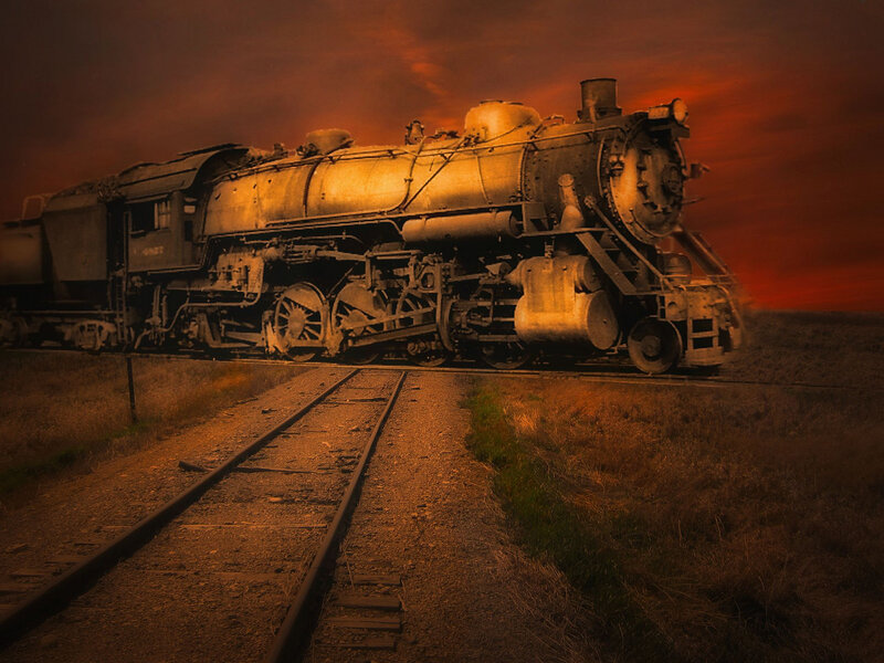 Steam Locomotive on Tracks — Orange, Dramatic