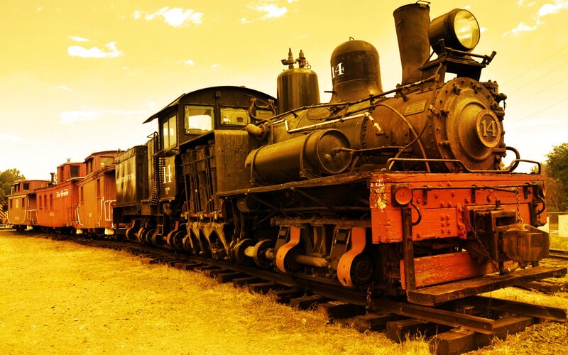 Steam Locomotive on Tracks — Yellow