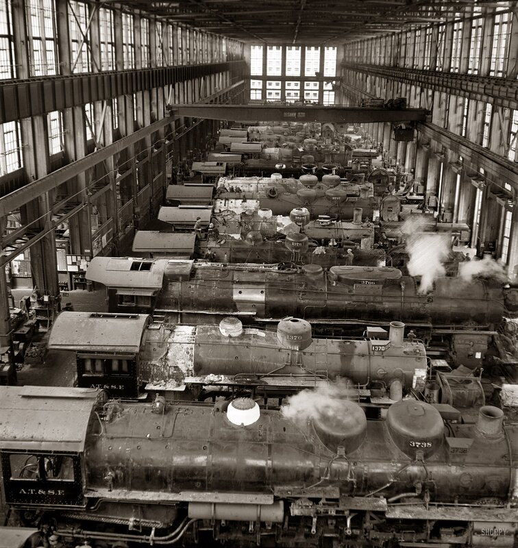 Steam locomotives in a repair shop