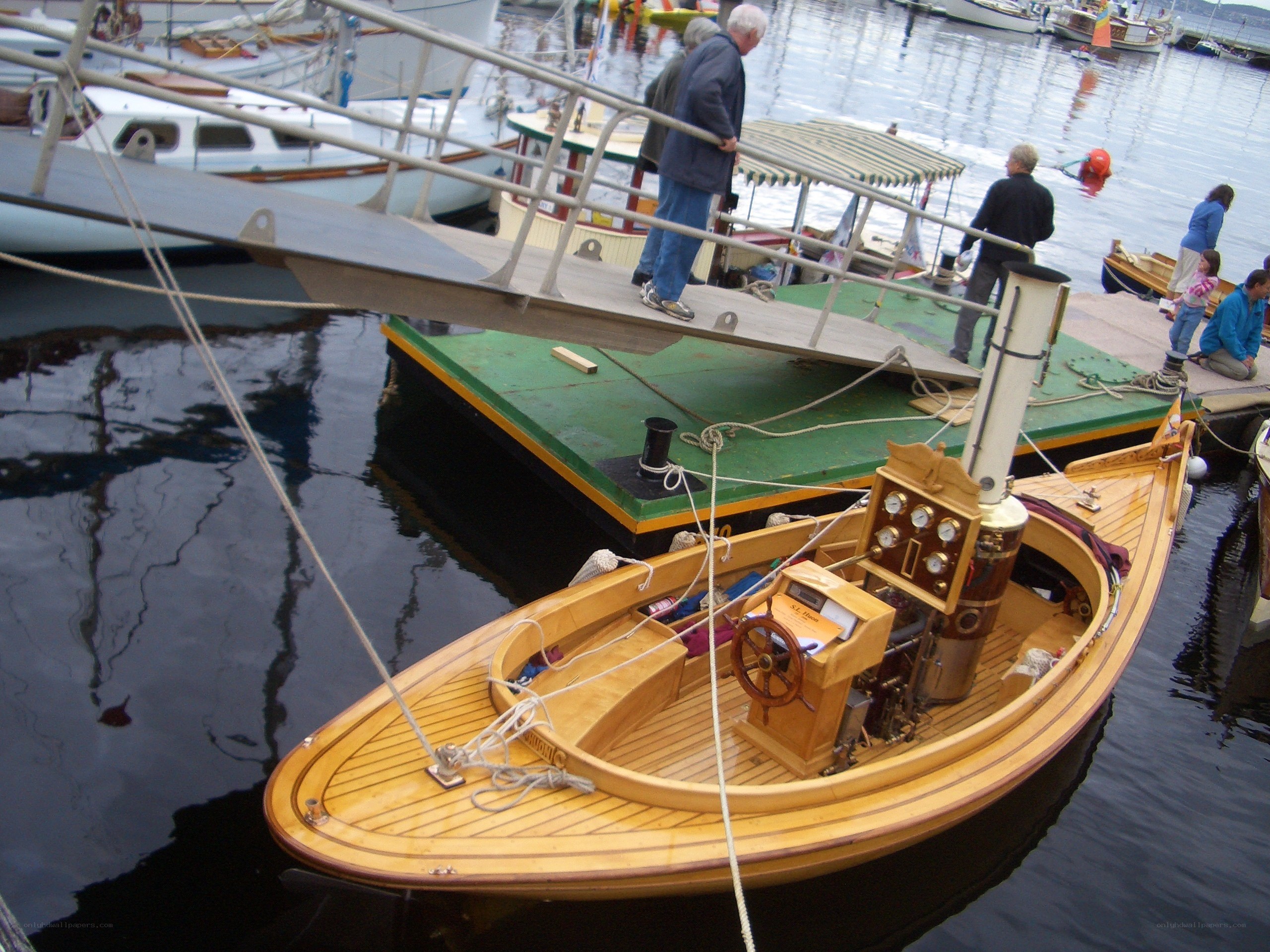 Steam-powered boat at a marina