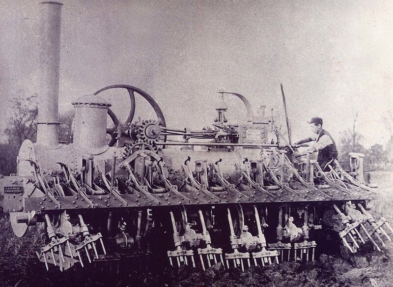 Steam-powered plow in field