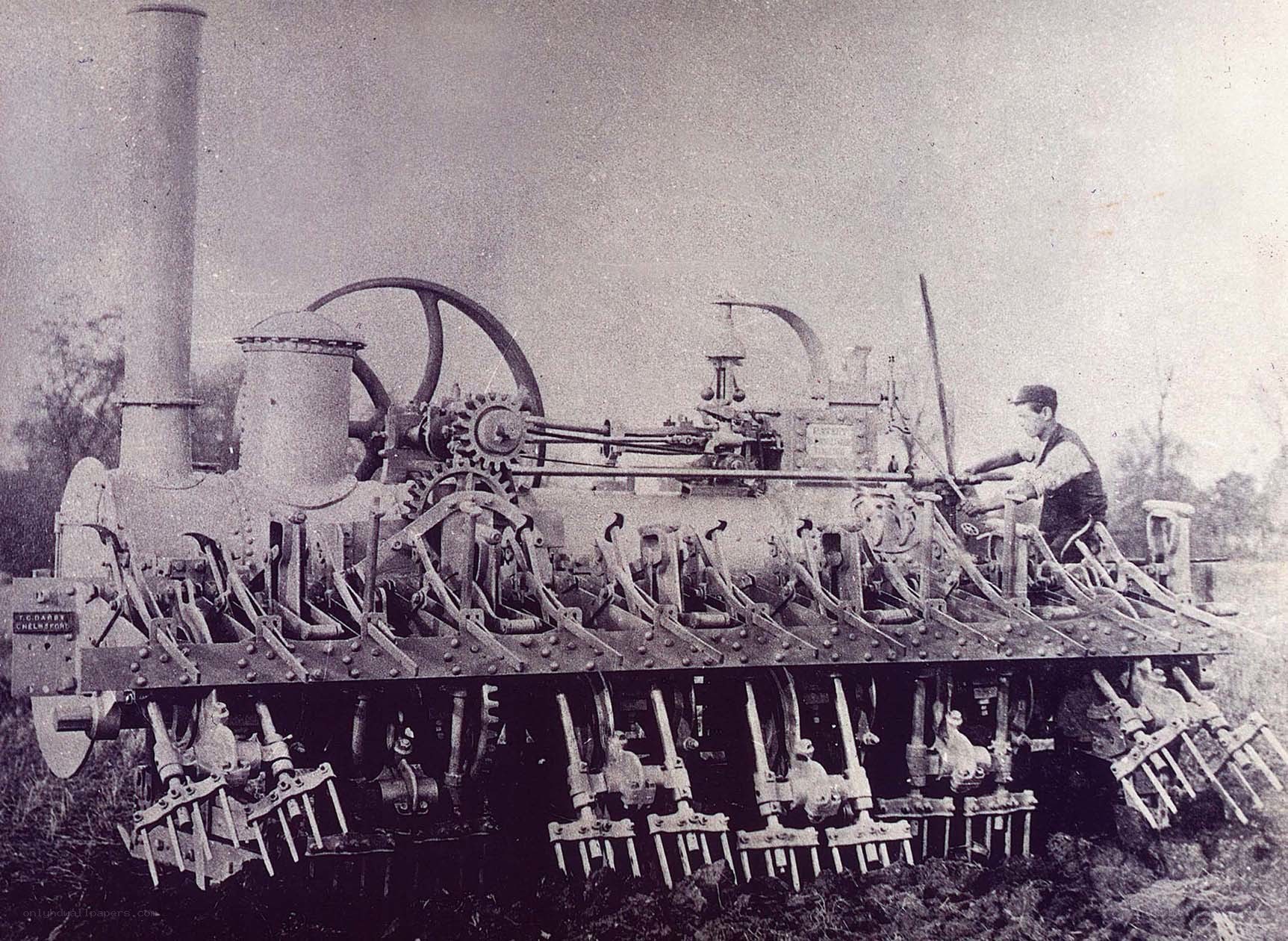 Steam-powered plow in field
