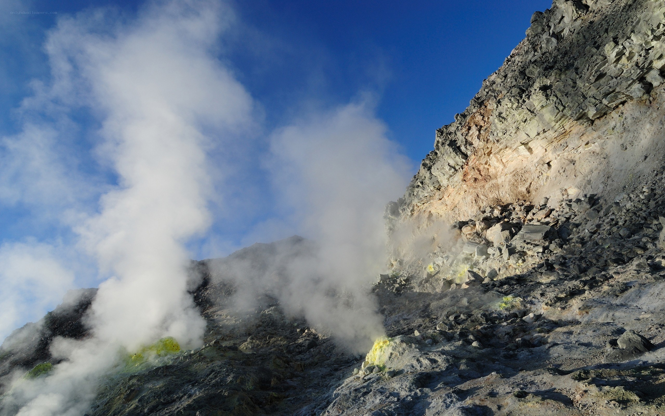 Steam rising from a volcanic slope