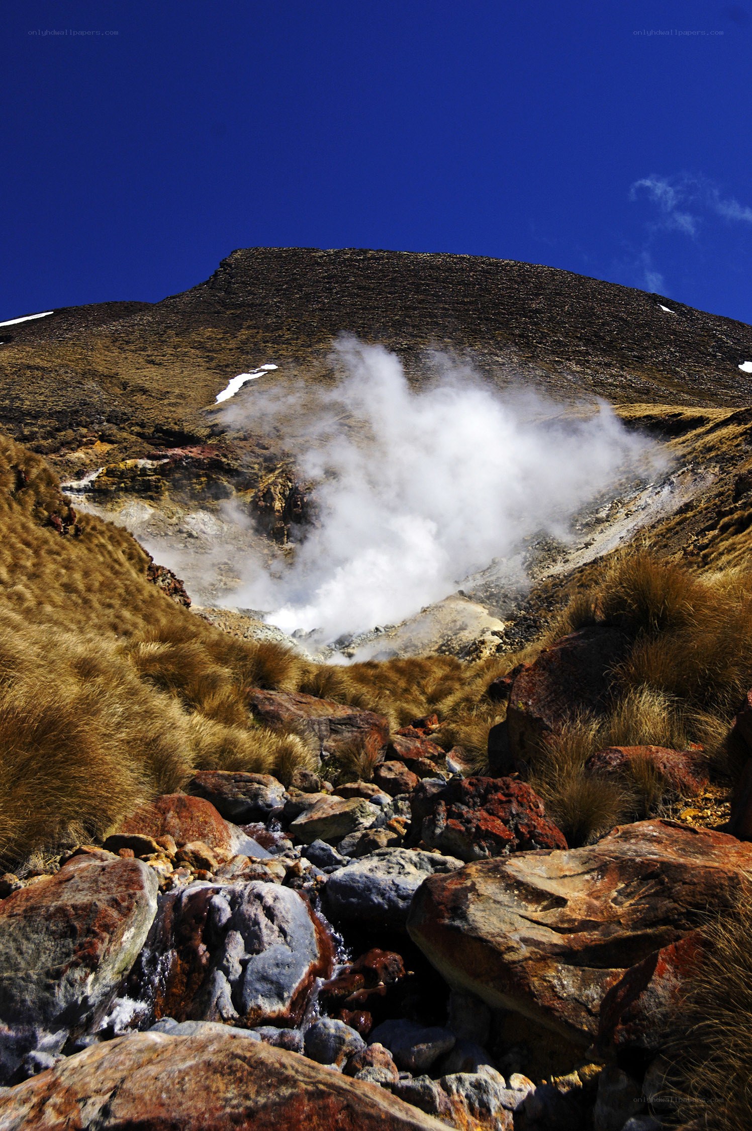 Steam rising from a volcanic vent