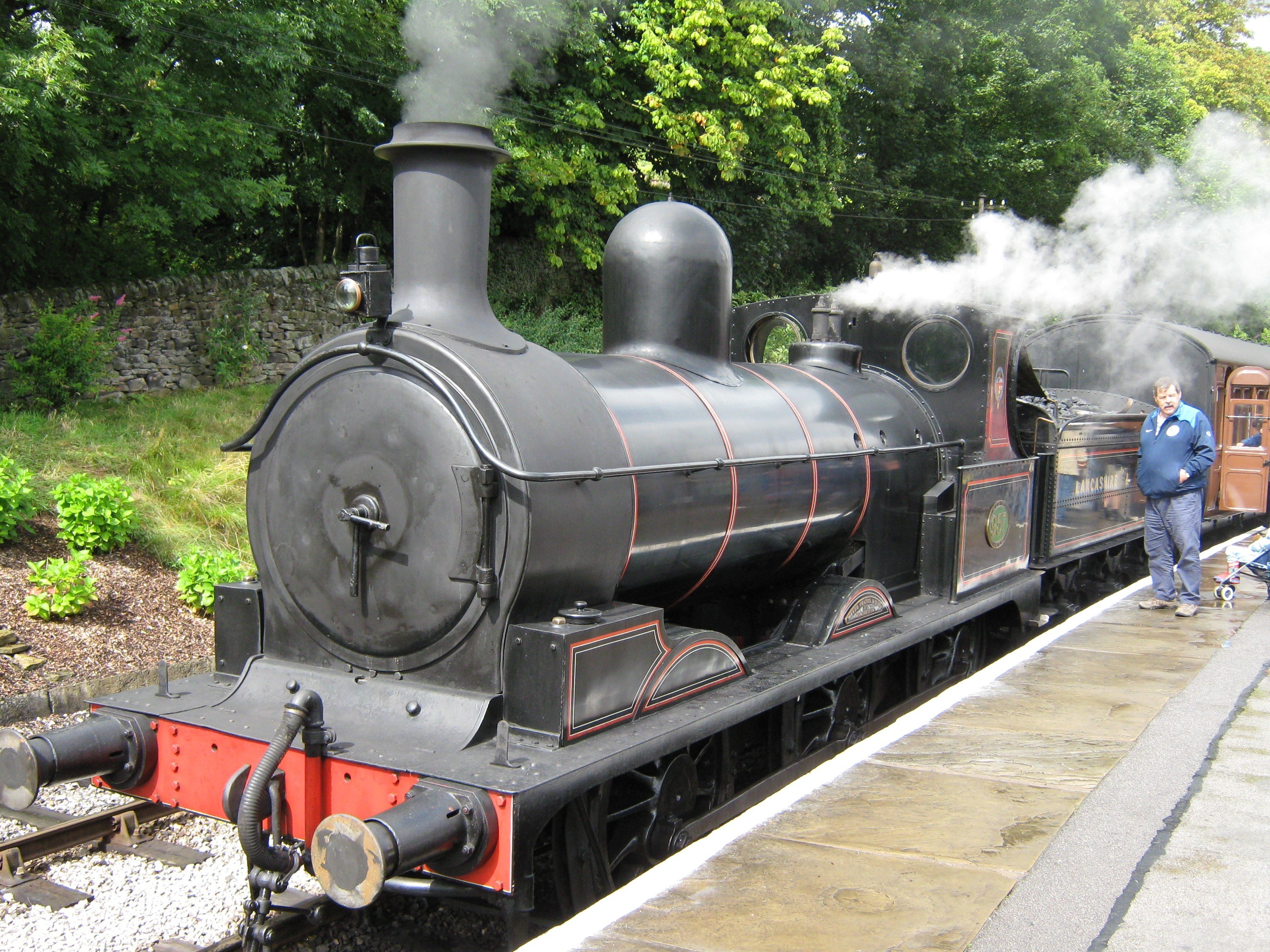 Steam train at a station