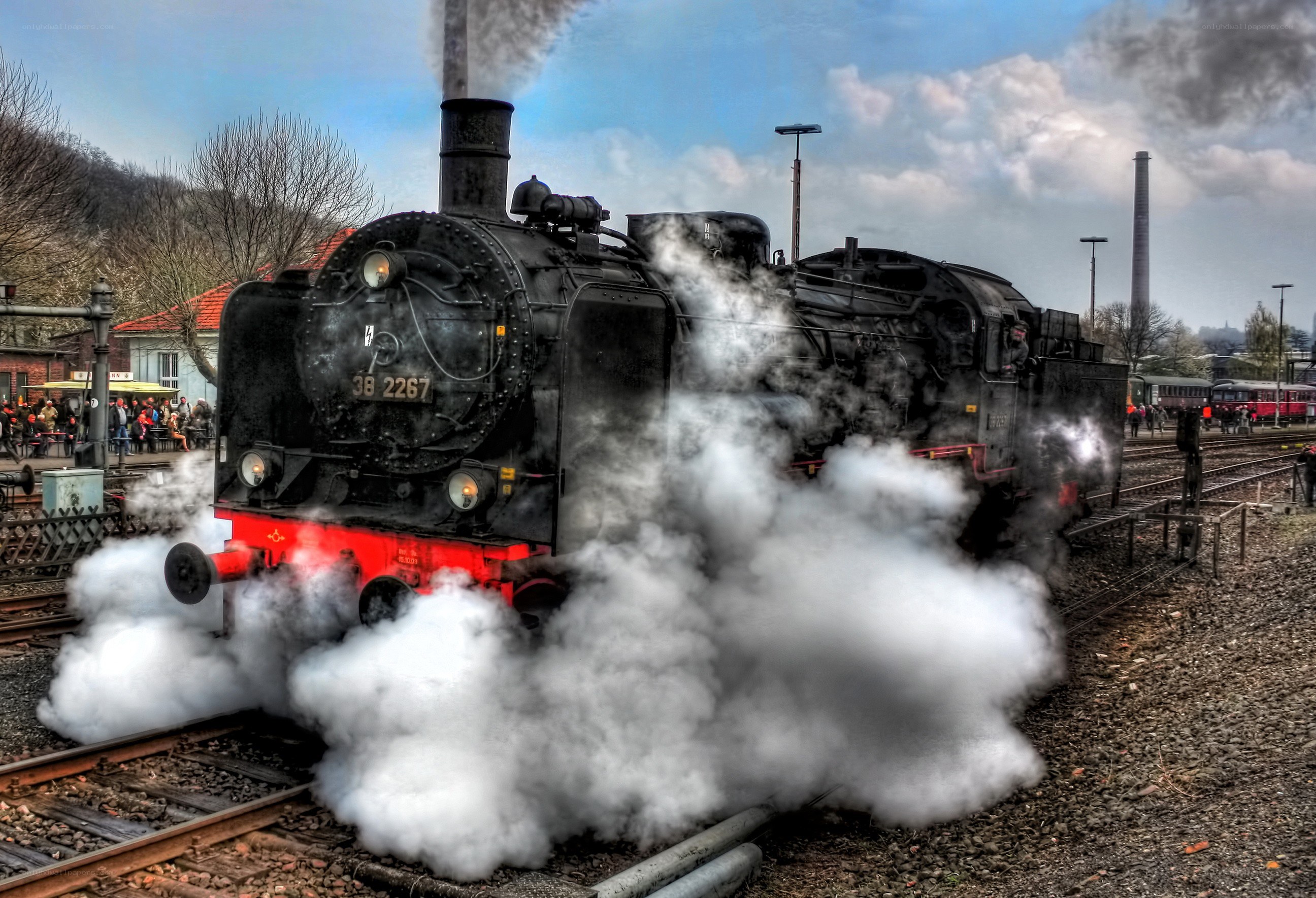 Steam train at a station