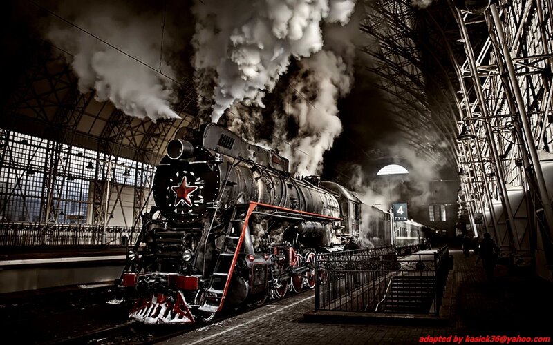 Steam train at a station