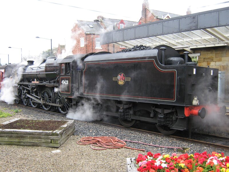 Steam train at a station