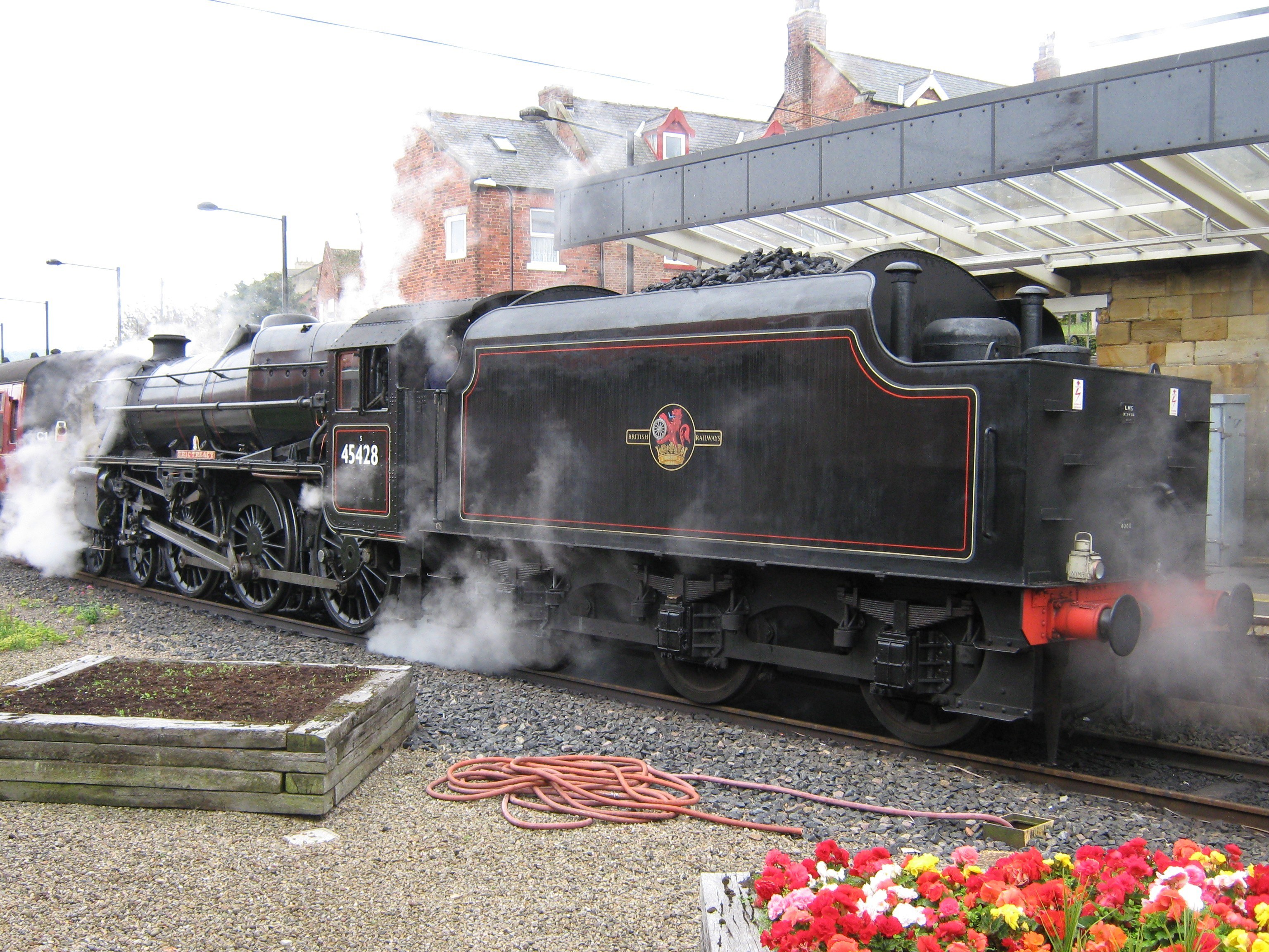 Steam train at a station