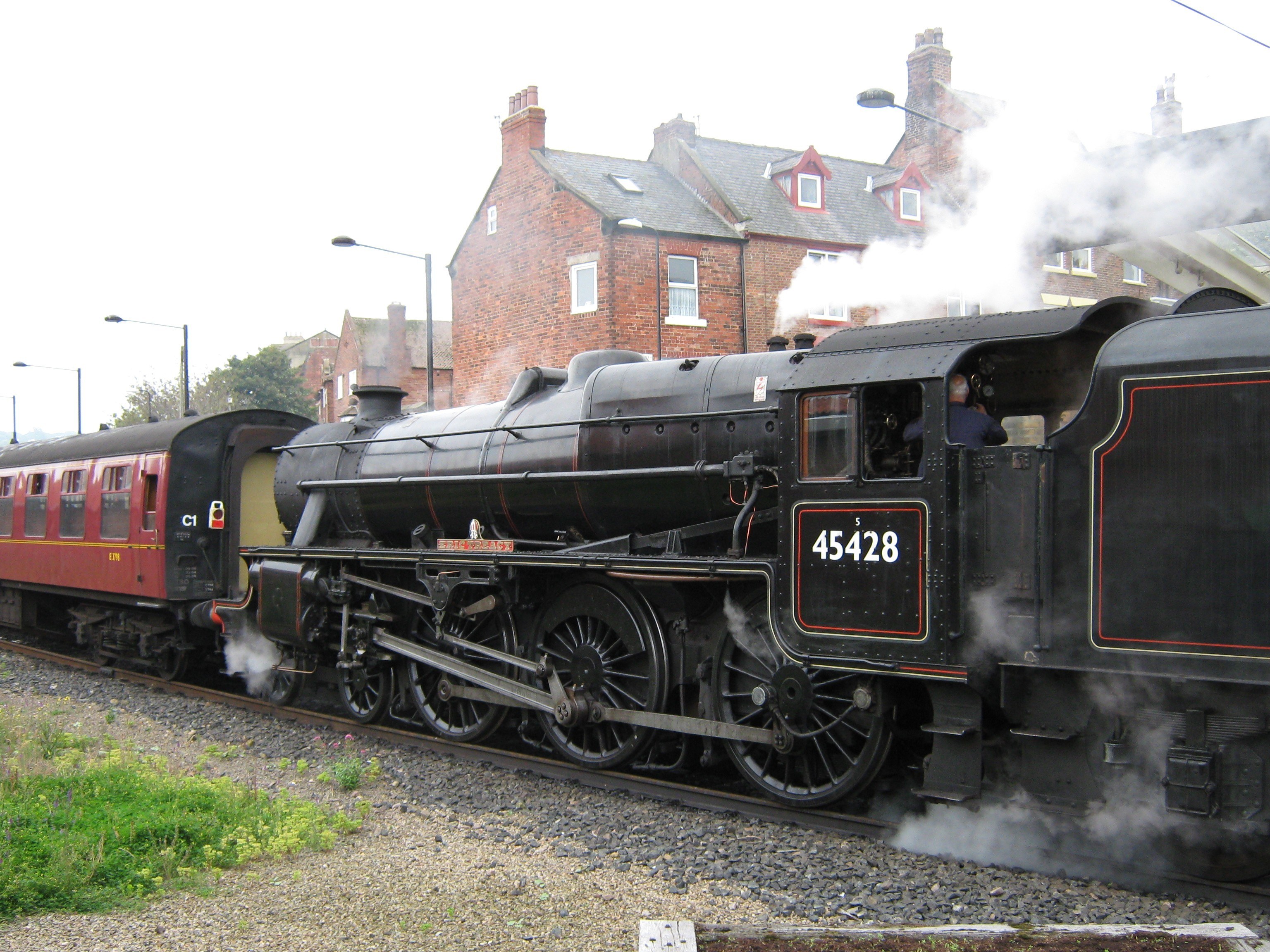 Steam train at a station