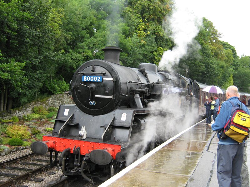 Steam train at a station
