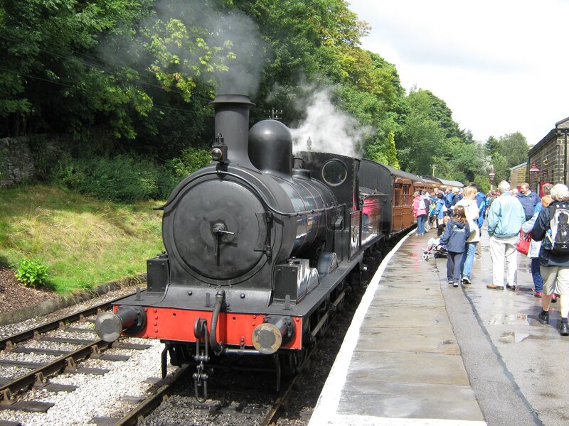 Steam train at a station