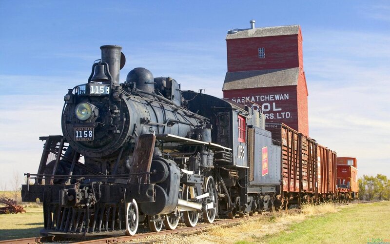 Steam train at grain elevator