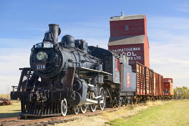 Steam train at grain elevator