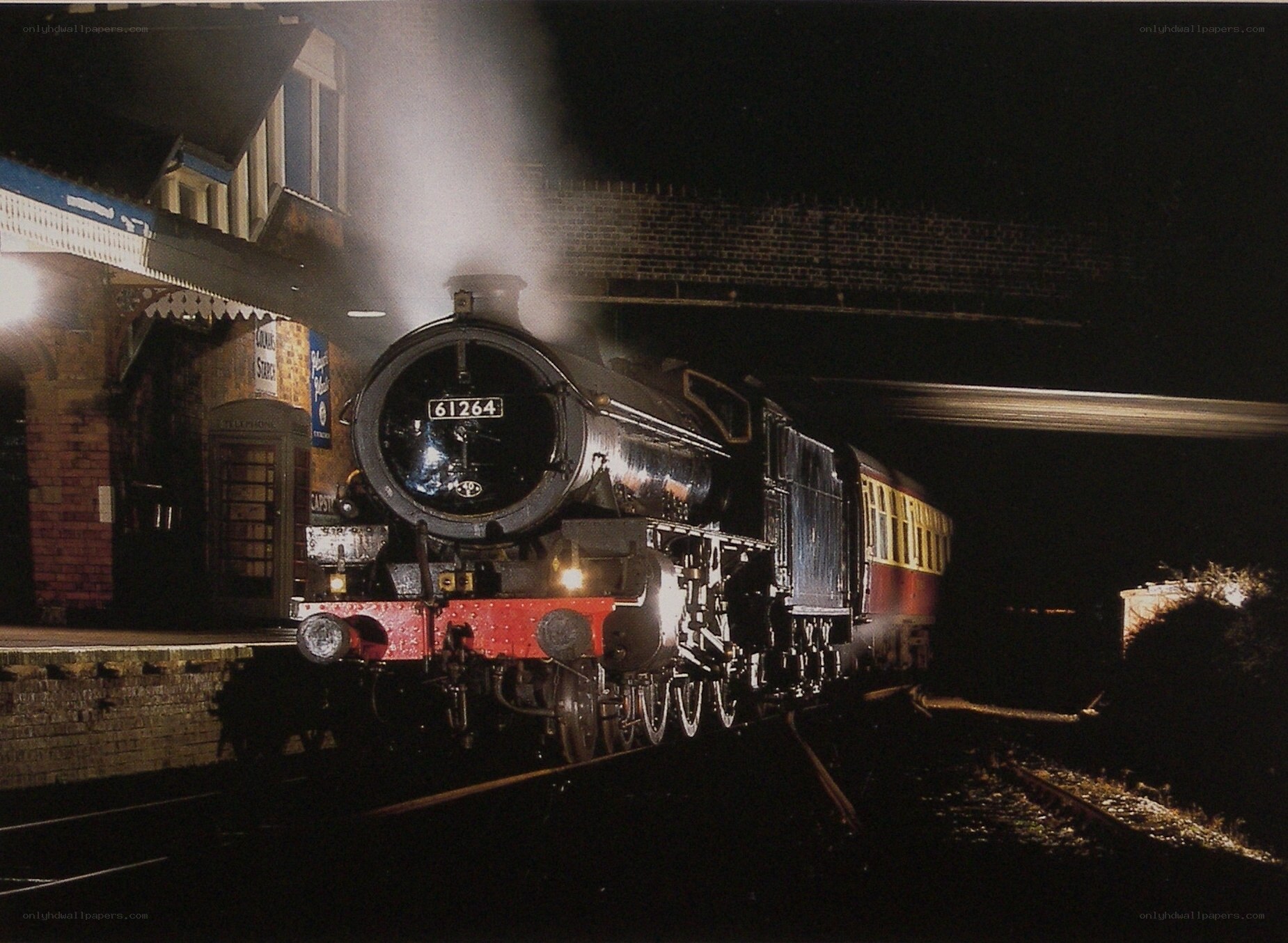 Steam train at night station
