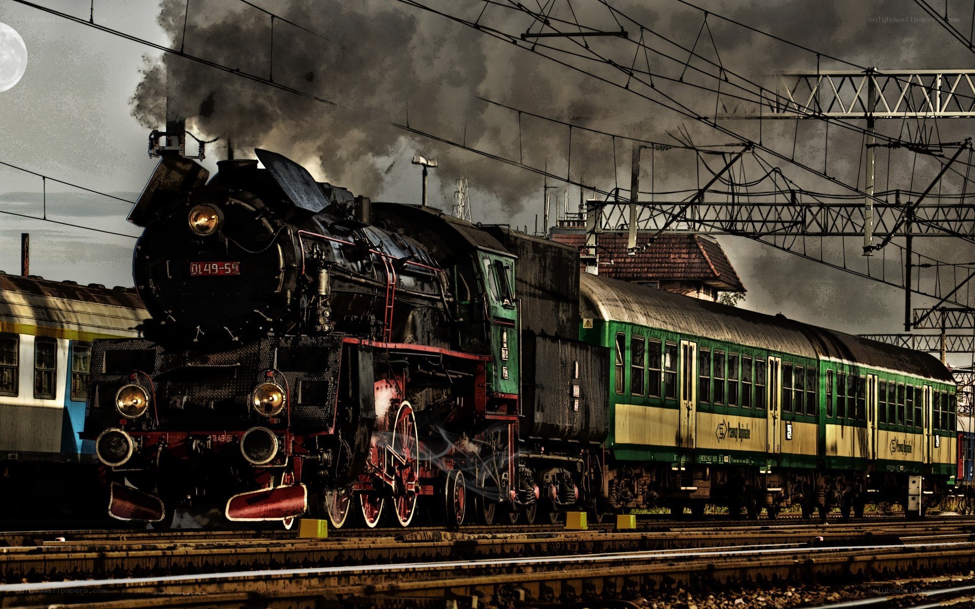 Steam train at railway station