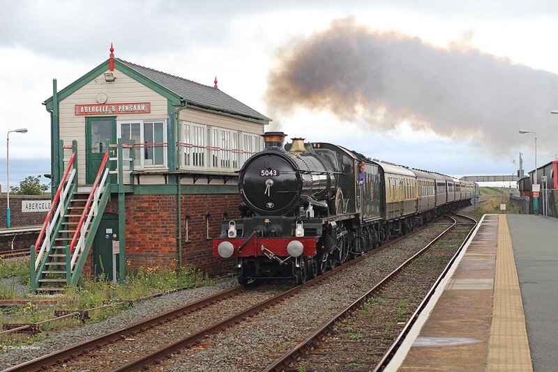 Steam Train at Station — Black, Dramatic, Afternoon
