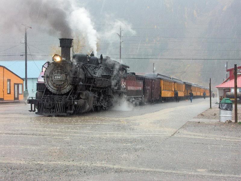 Steam Train at Station — Black, Rainy