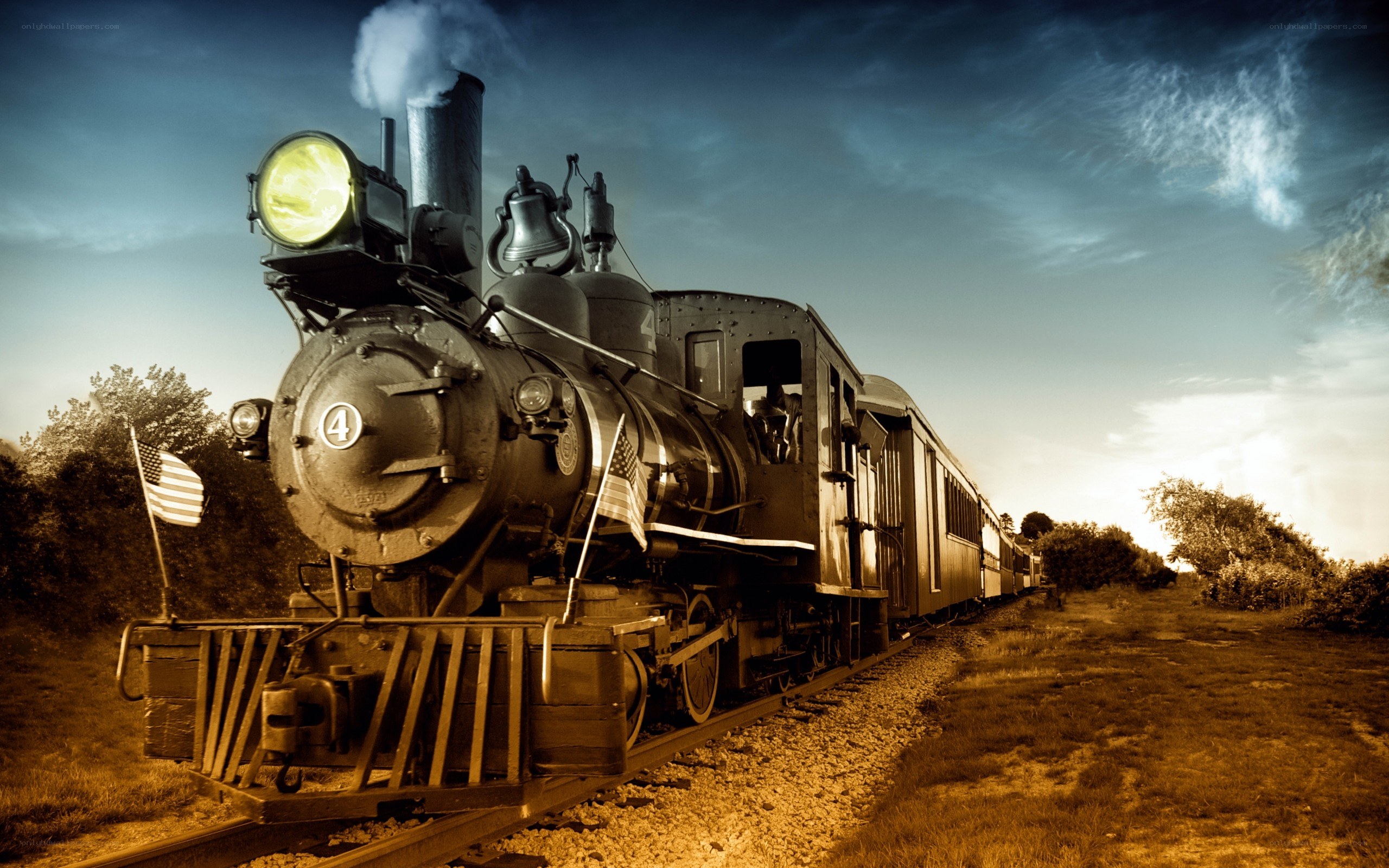 Steam train at sunset