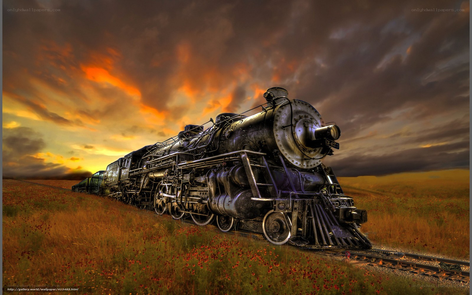 Steam train at sunset